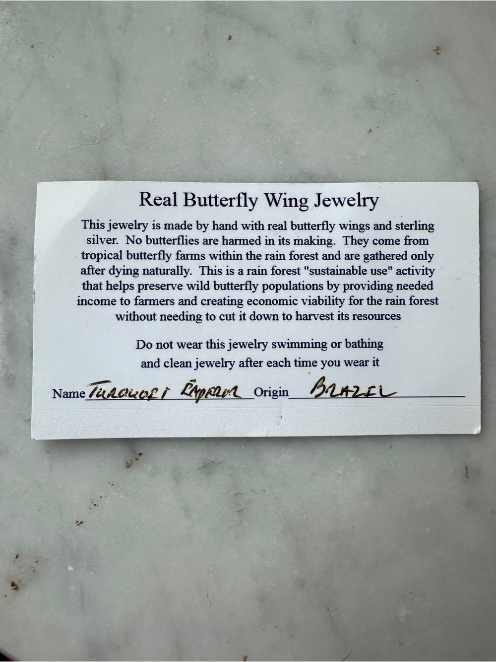 Reversible Silver Butterfly Pendant with Blue-Green and Camouflage Wings - Picture 3 of 5